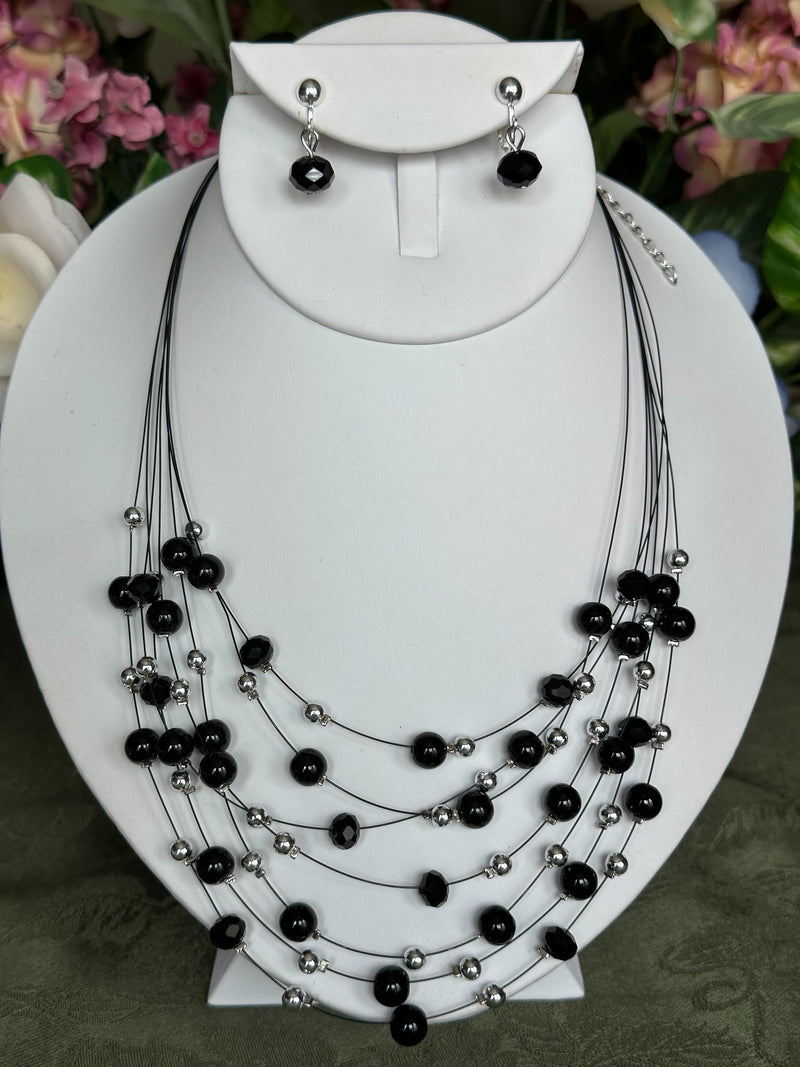 Clip on gunmetal and red bead multi strand black wire necklace and earring set