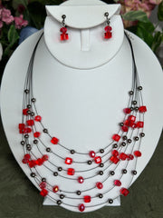 Clip on gunmetal and red bead multi strand black wire necklace and earring set