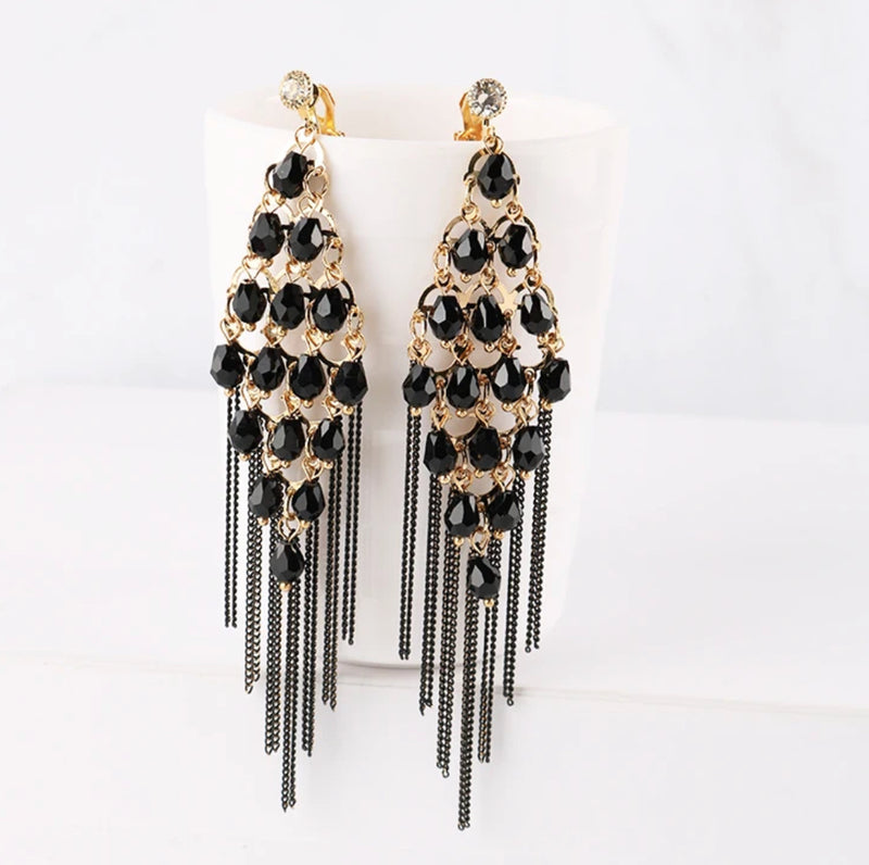 Clip on 4 1/4" long gold and black stone layered black thread earrings