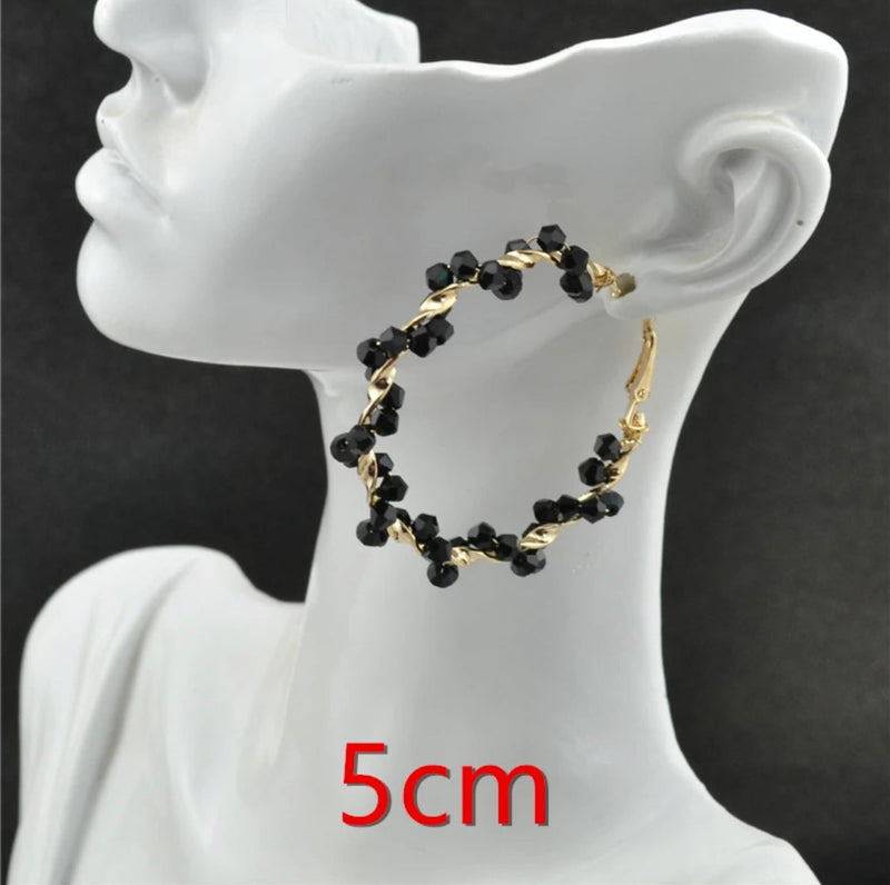 Clip on 2 1/4" gold and twisted shiny black bead hoop earrings