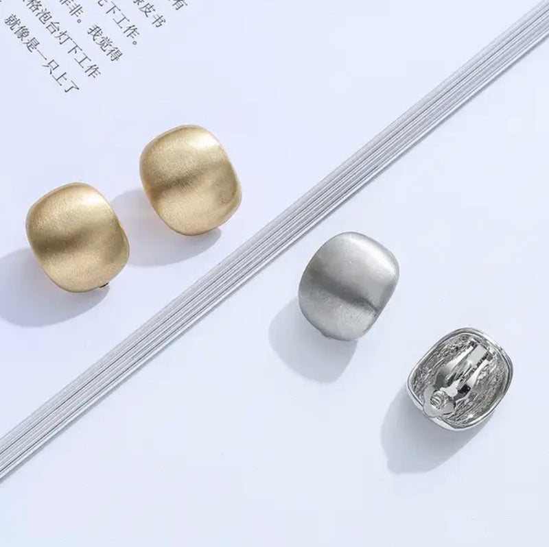 Clip on 1" matte gold wide dome button style earrings