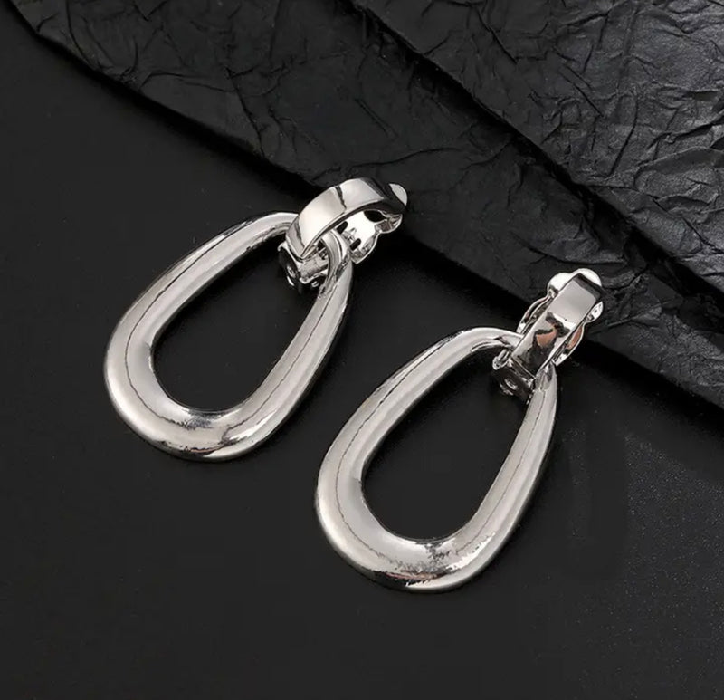 Clip on 1 3/4" shiny silver door knob style dangle earrings