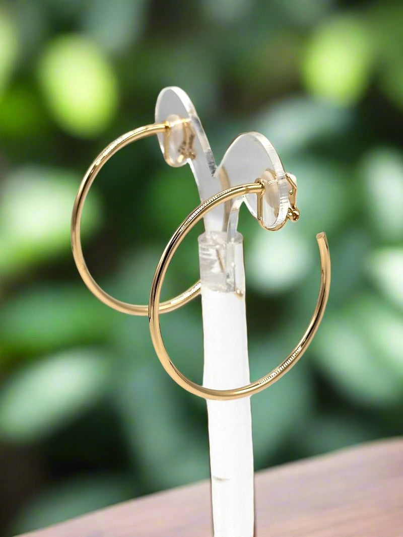 Clip on 1 3/4" shiny gold open back hoop earrings