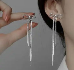 Clip on 3 3/4" xlong spring back silver bow dangle chain earrings