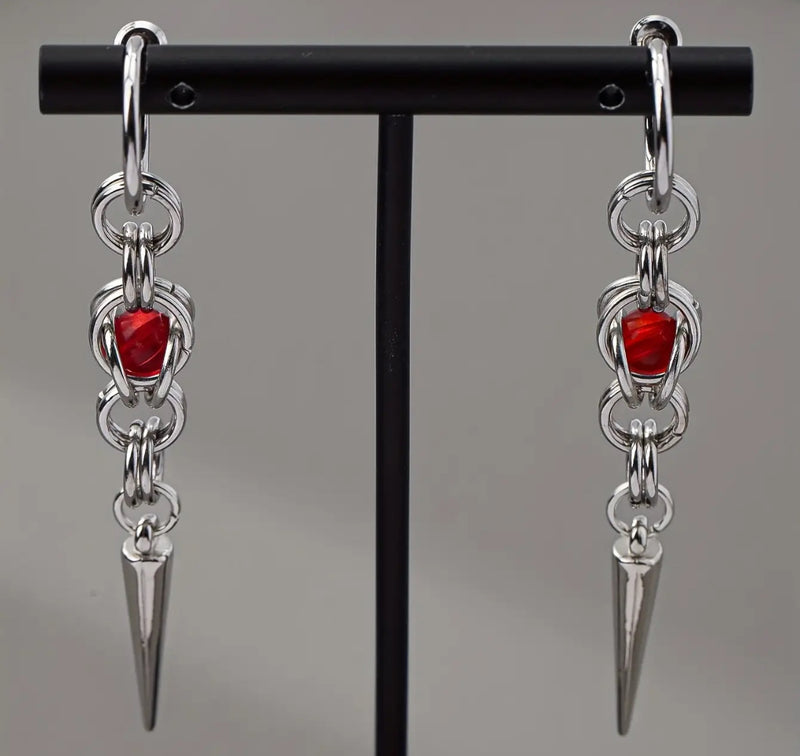 Clip on 3" silver hoop and chain earrings with red stone and spike