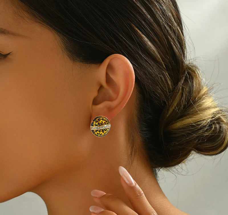 Clip on 1/2" small gold and black animal print round earrings