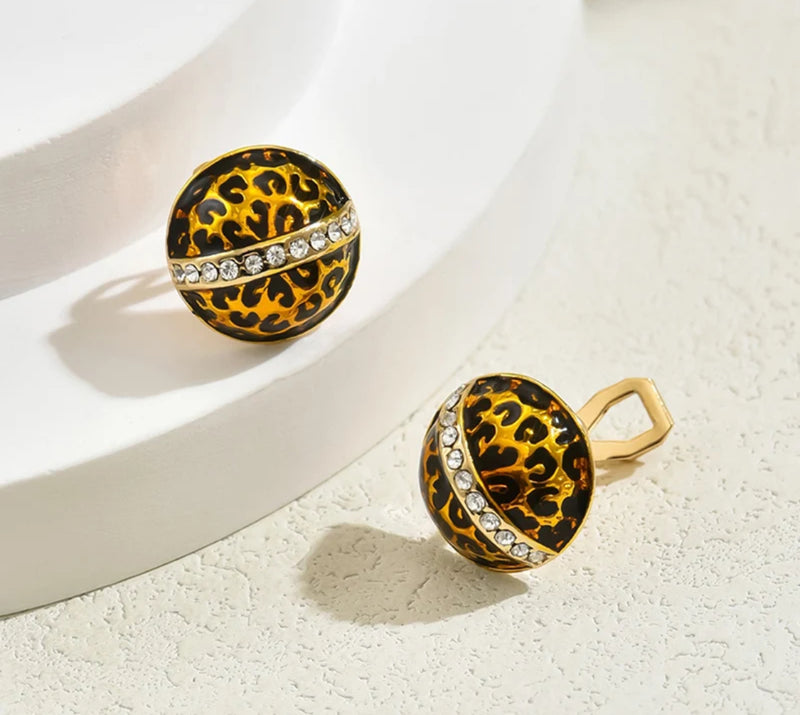 Clip on 1/2" small gold and black animal print round earrings