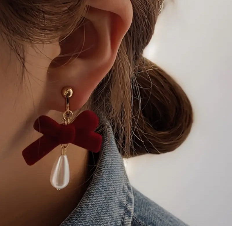 Clip on 2" gold and red velvet bow earrings with dangle pearl