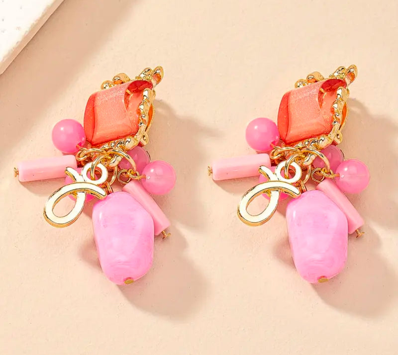 Clip on 2 3/4" gold, pink and peach stone earrings with dangle beads