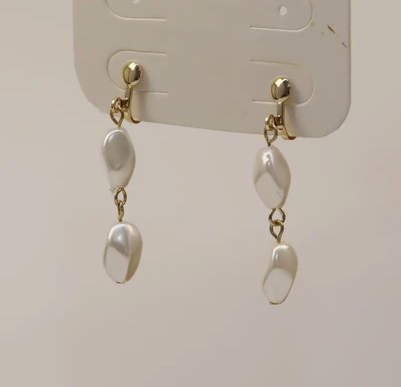 Clip on 1 1/2" gold and white hammered dangle pearl earrings
