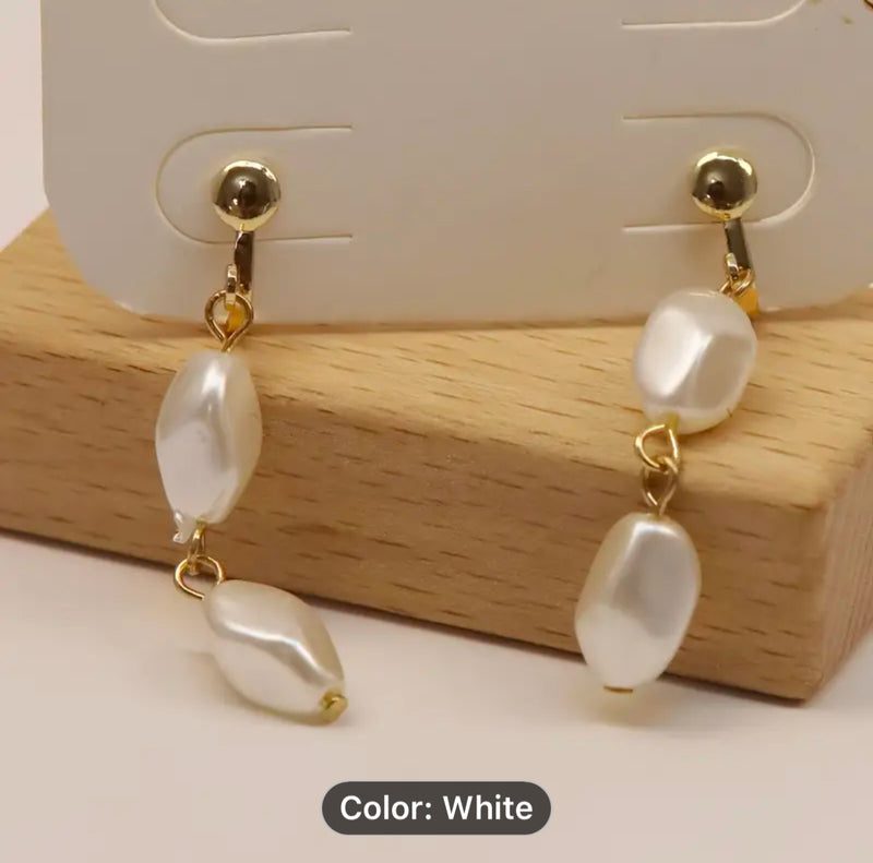 Clip on 1 1/2" gold and white hammered dangle pearl earrings