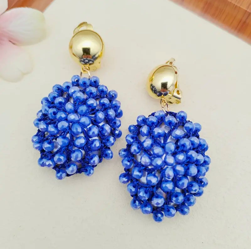Clip on 2" shiny gold and blue bead cluster dangle earrings