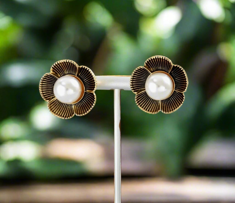 Clip on 1" gold and black flower earrings with center pearl earrings