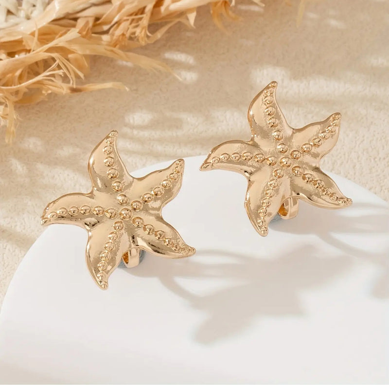 Clip on 1" gold dot starfish button style earrings