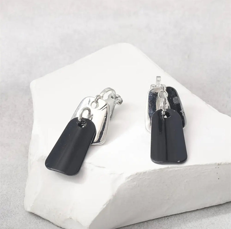 Clip on 1 1/4" silver and black layered dangle earrings