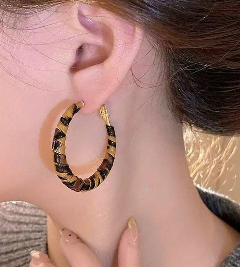 Clip on 2 3/4" gold, black and red  animal print PU leather hoop earrings