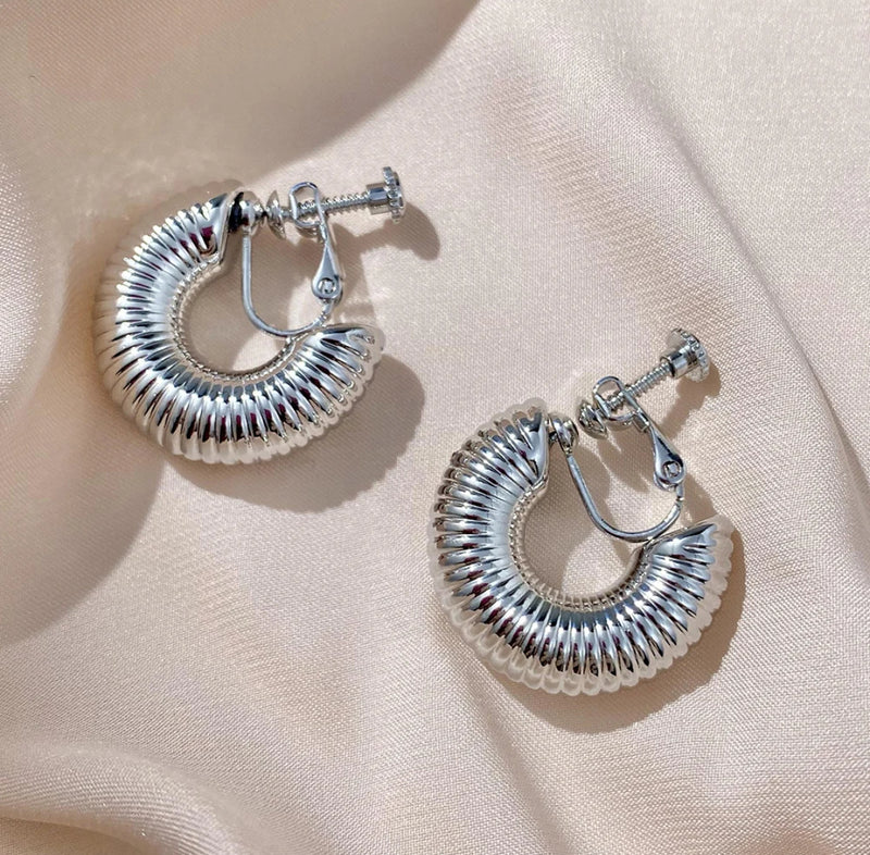 Clip on 1" silver wide barrel indented open back hoop earrings