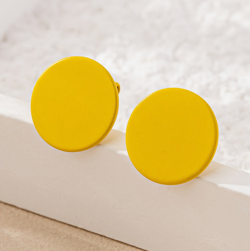 Clip on 3/4" small yellow flat button style earrings