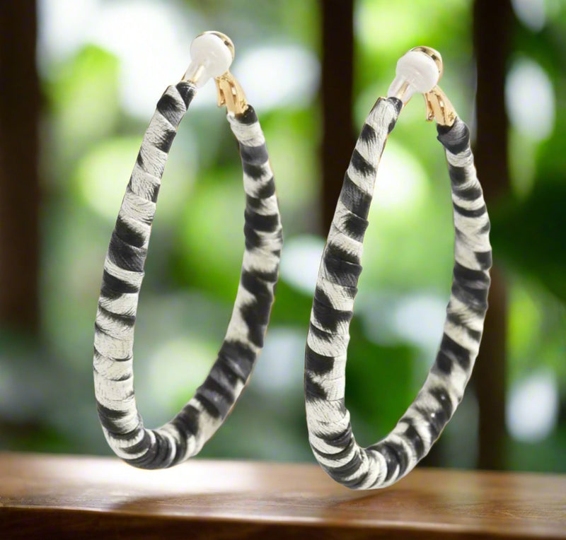 Clip on 2 3/4" gold, black, white animal print PU leather teardrop hoop earrings