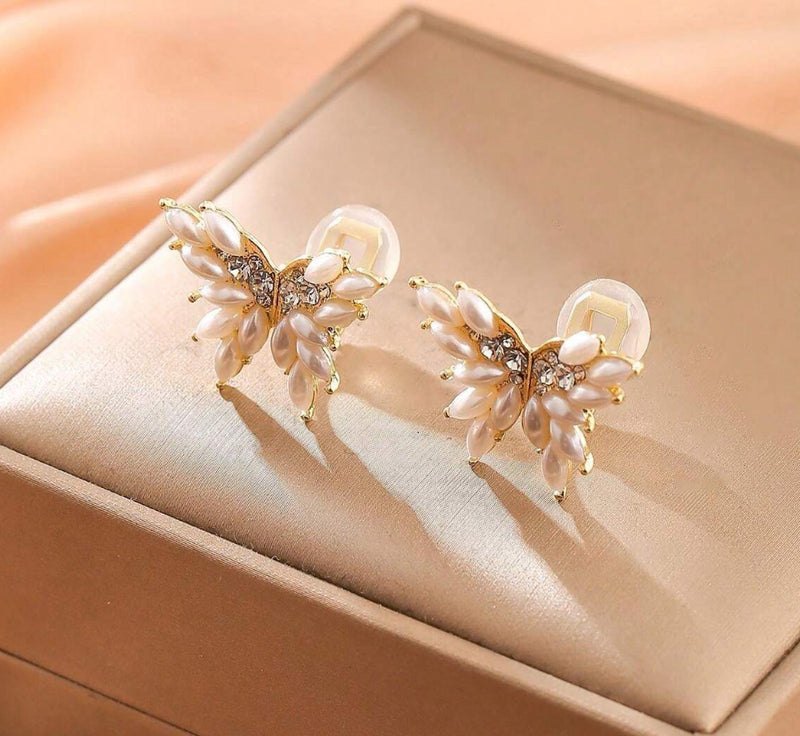 Clip on 3/4" gold, cream pearl and clear stone butterfly earrings