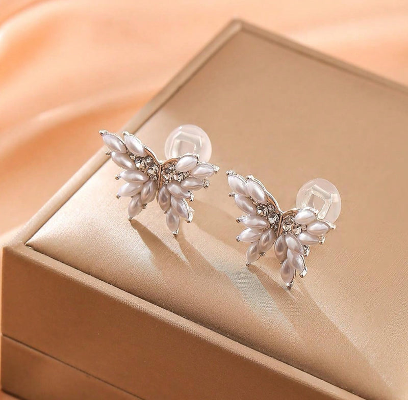 Clip on 3/4" silver, cream pearl and clear stone butterfly earrings