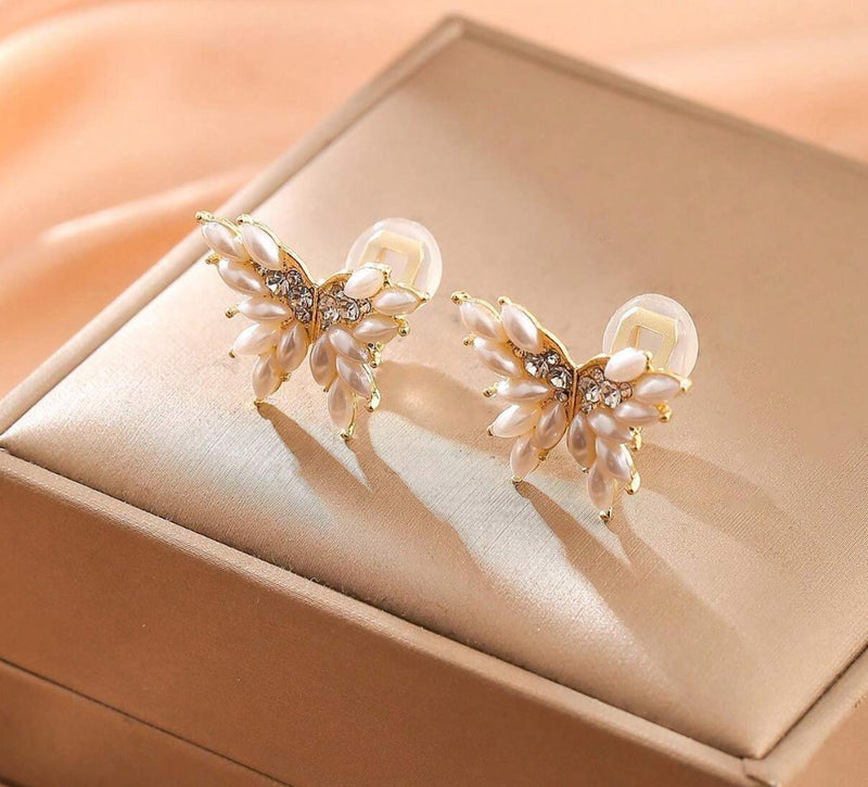 Clip on 3/4" gold, cream pearl and clear stone butterfly earrings