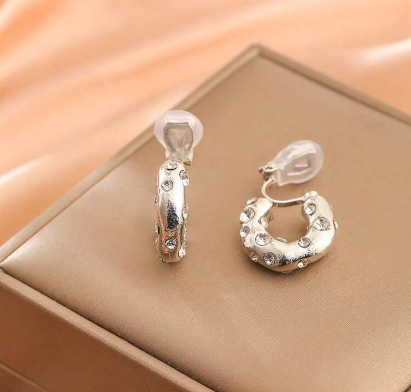 Clip on 3/4" small silver barrel style hoop earrings with clear stones