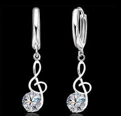 Sterling silver pierced hoop necklace set with music note and clear stone