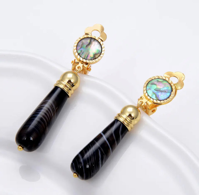 Clip on 2 1/4" gold, green abalone shell earrings with brown or black bead