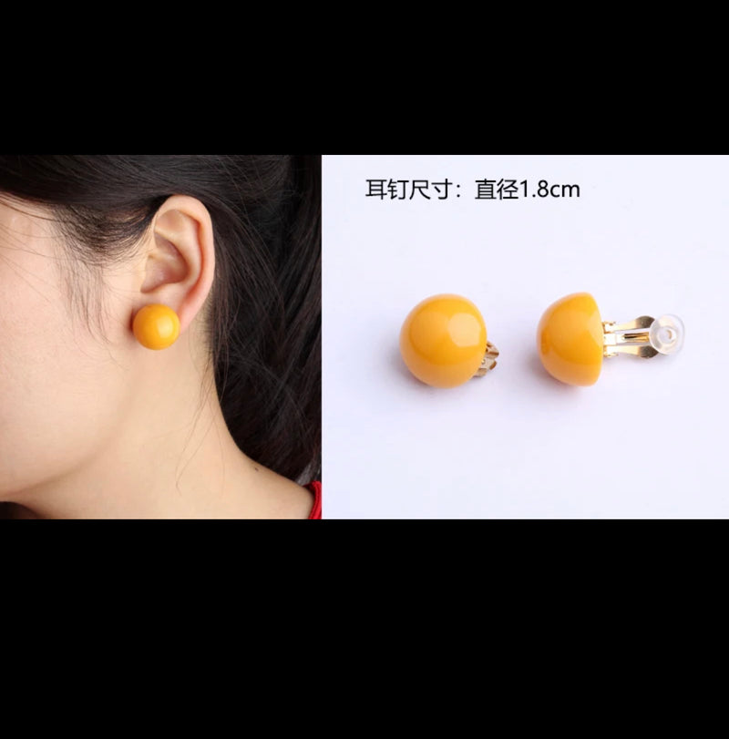 Clip on 3/4" gold, yellow or cream round button style earrings
