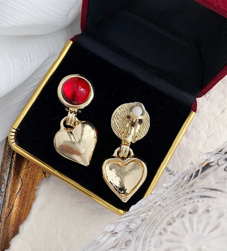 Clip on 1 3/4" gold and red stone dangle heart earrings