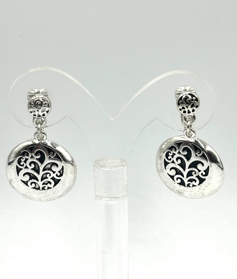 Clip on 1 1/2" silver and black cutout dangle earrings