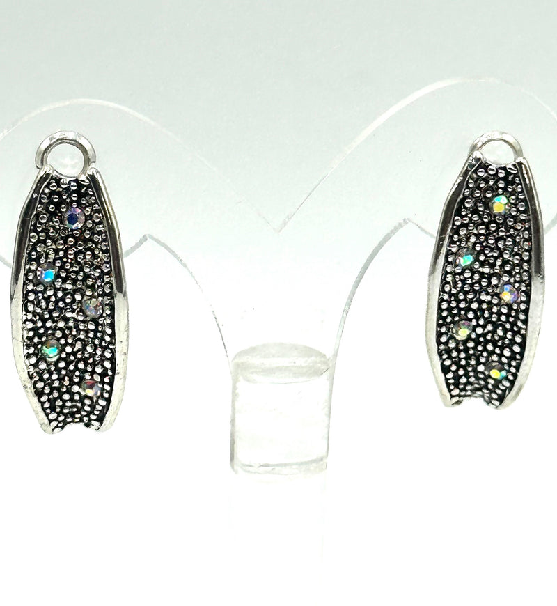 Clip on 1 1/4" silver and black bent earrings w/fluorescent stones