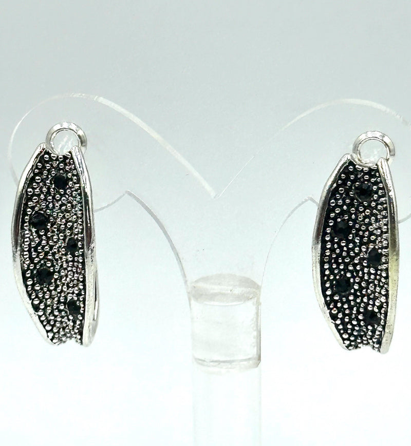 Clip on 1 1/4" silver and black bent earrings w/black stones