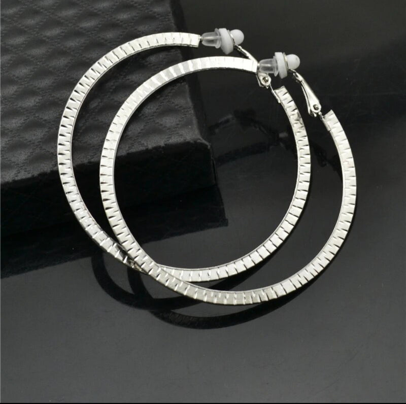 Clip on 2 1/2" silver indented block print hoop earrings