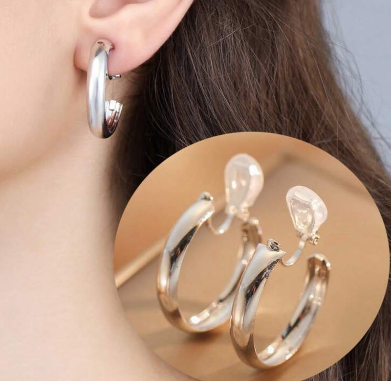 Clip on 1 1/4" shiny gold lightweight open back hoop earrings