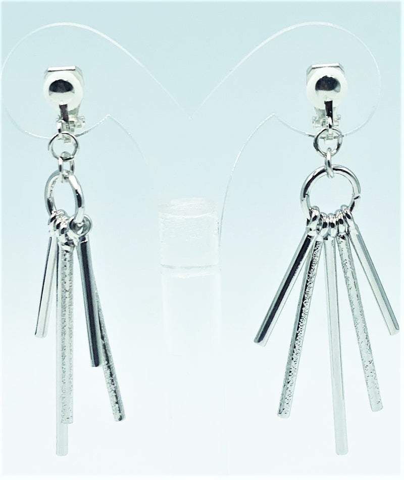 Clip on 2 3/4" silver dangle textured graduated stick earrings