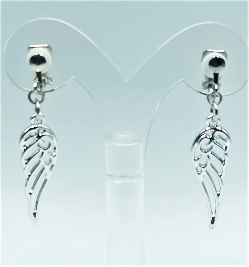 Clip on 1 3/4" silver cutout dangle wing earrings