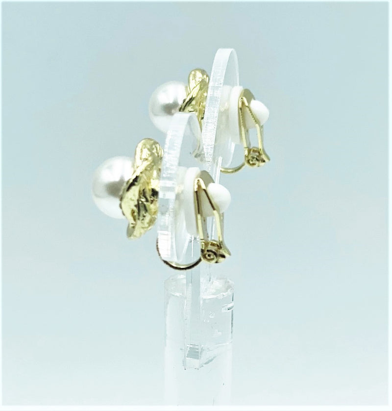 Clip on 1/2" small gold and clear stone knot earrings with white pearl center