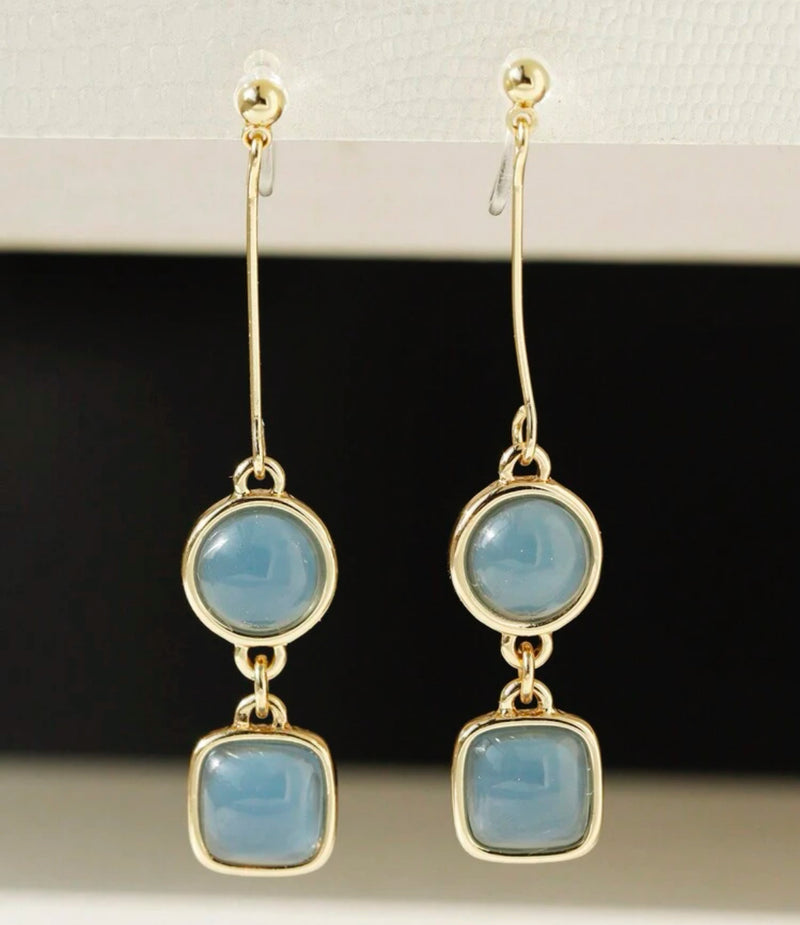 Clip on 2 1/4" comfort fit clasp gold wire and blue bead dangle earrings