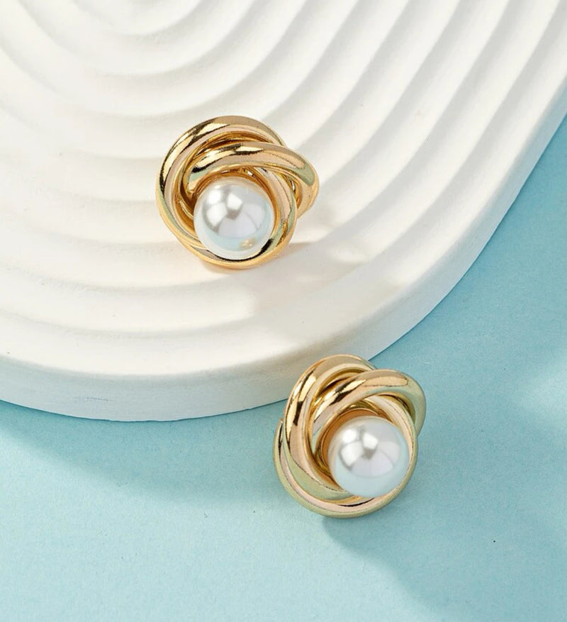 Clip on 3/4" gold knot earrings with center white pearl