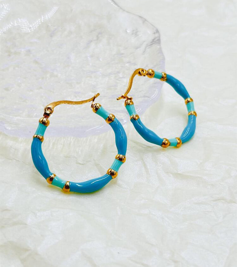 Pierced 1 1/4" gold, blue and turquoise stripe hoop earrings
