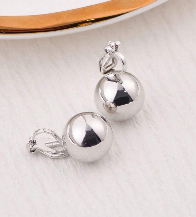 Clip on .07 silver 3/4" button style ball earrings