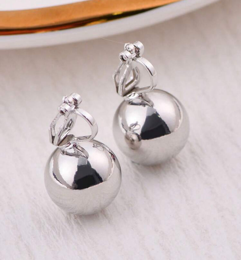 Clip on .07 silver 3/4" button style ball earrings