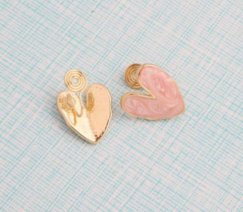 Clip on 1" gold comfort fit squeeze back peach heart earrings