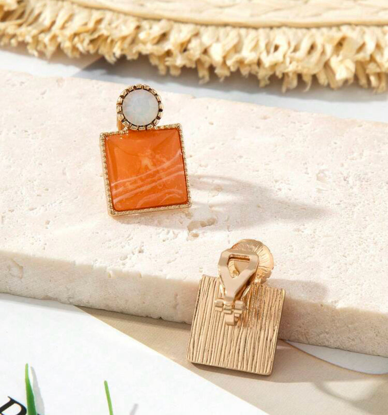 Clip on 3/4" gold, white, orange and white square button style earrings