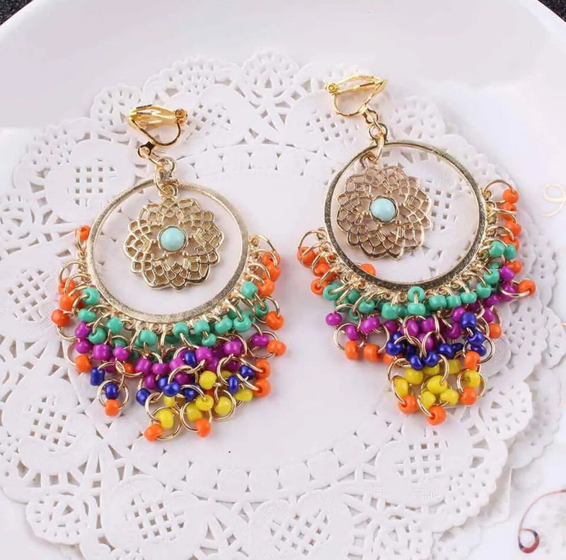 Clip on 3" gold dangle hoop earrings with multi colored beads