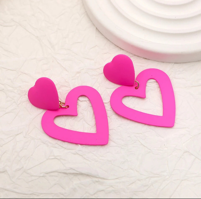 Clip on 2 1/4" pink double cutout dangle metal heart earrings