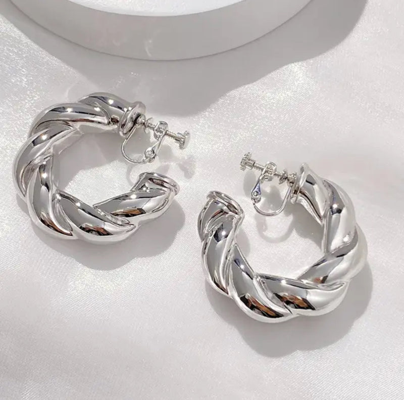 Clip on 1 3/4" shiny silver wide twisted open back hoop earrings
