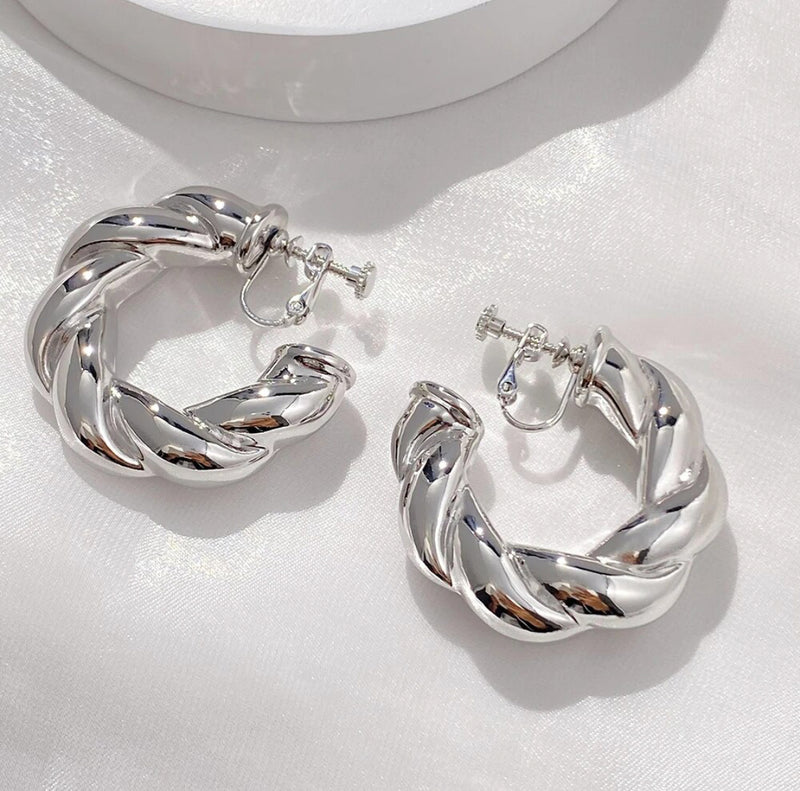 Clip on 1 3/4" shiny silver wide twisted open back hoop earrings